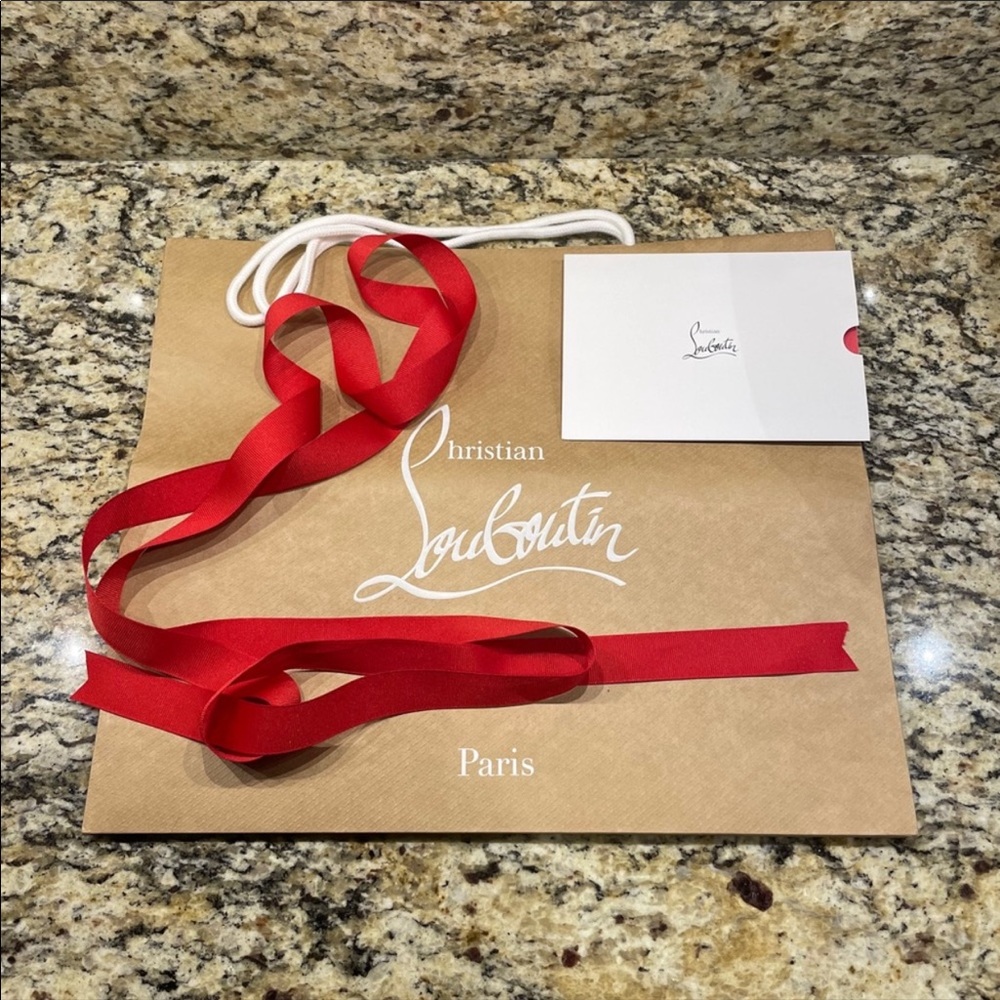 Christian Louboutin gift bag with trimmings